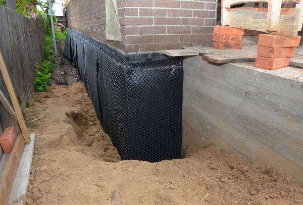 SJ Waterproofing Pros technician performing targeted Vapor Barrier Installation assessment in Webster, IN